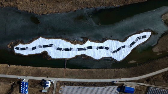 Aerial view of Lee Bae's daljip taeugi (moon house burning) ceremony before undergoing combustion in Cheongdo, North Gyeongsang, on Feb. 12, the day of Jeongwol Daeboreum, or the first full moon of the year. [JOHYUN GALLERY]