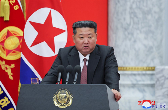 North Korean leader Kim Jong-un delivers a speech during a visit to the Ministry of National Defense to mark the 77th anniversary of the founding of the Korean People's Army on Feb. 9, in this photo released by the state-run Korean Central News Agency. [YONHAP]