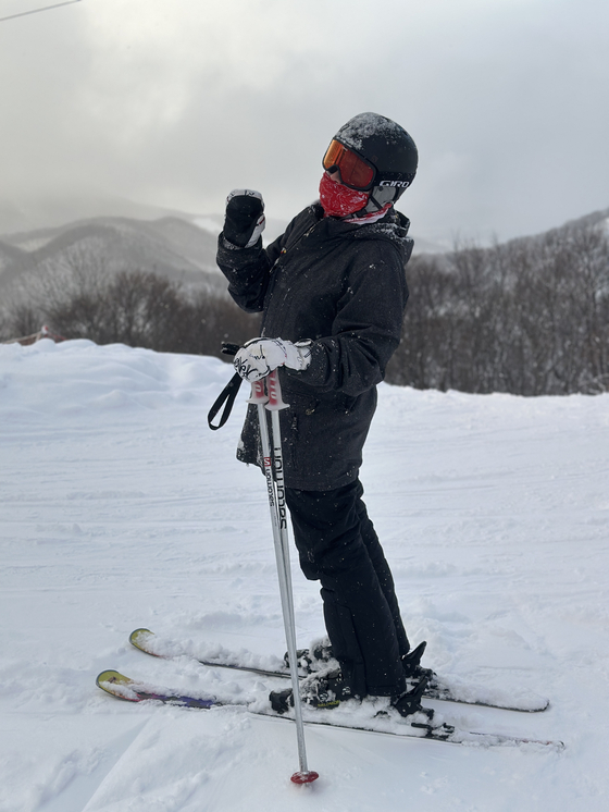 Monica waves to the camera before taking off down the slope. [RAMONA PARK]
