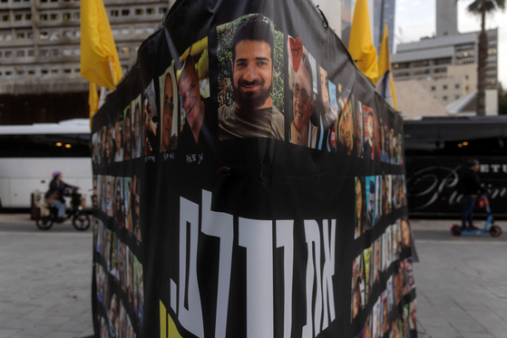 Posters of the hostages kidnapped during the deadly Oct. 7, 2023 attack by Hamas, in Tel Aviv, Israel, on Feb. 18 [REUTERS/YONHAP]