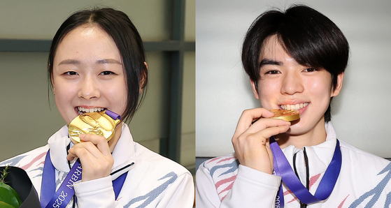 Figure skating national team members Kim Chae-yeon, left, and Cha Jun-hwan pose for the press on Friday, Feb. 14 after winning gold at the Asian Winter Games held in Harbin, China. [NEWS1]