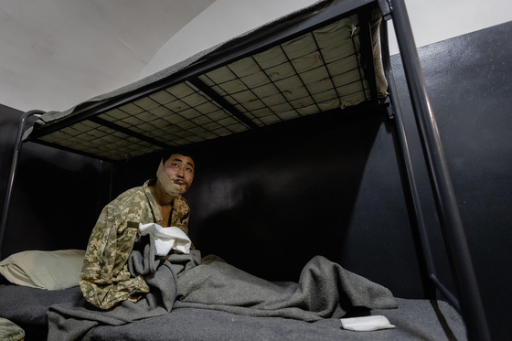 A wounded soldier, suspected to be North Korean and captured by Ukrainian forces, is seen in this file photo posted on Ukrainian President Volodymyr Zelensky's Telegram on Jan. 11. [YONHAP] 