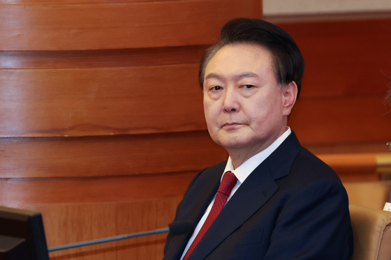 President Yoon Suk Yeol sits in the main chamber of the Constitutional Court in Jongno District, central Seoul, during his impeachment trial hearing on Jan. 21. [NEWS1]