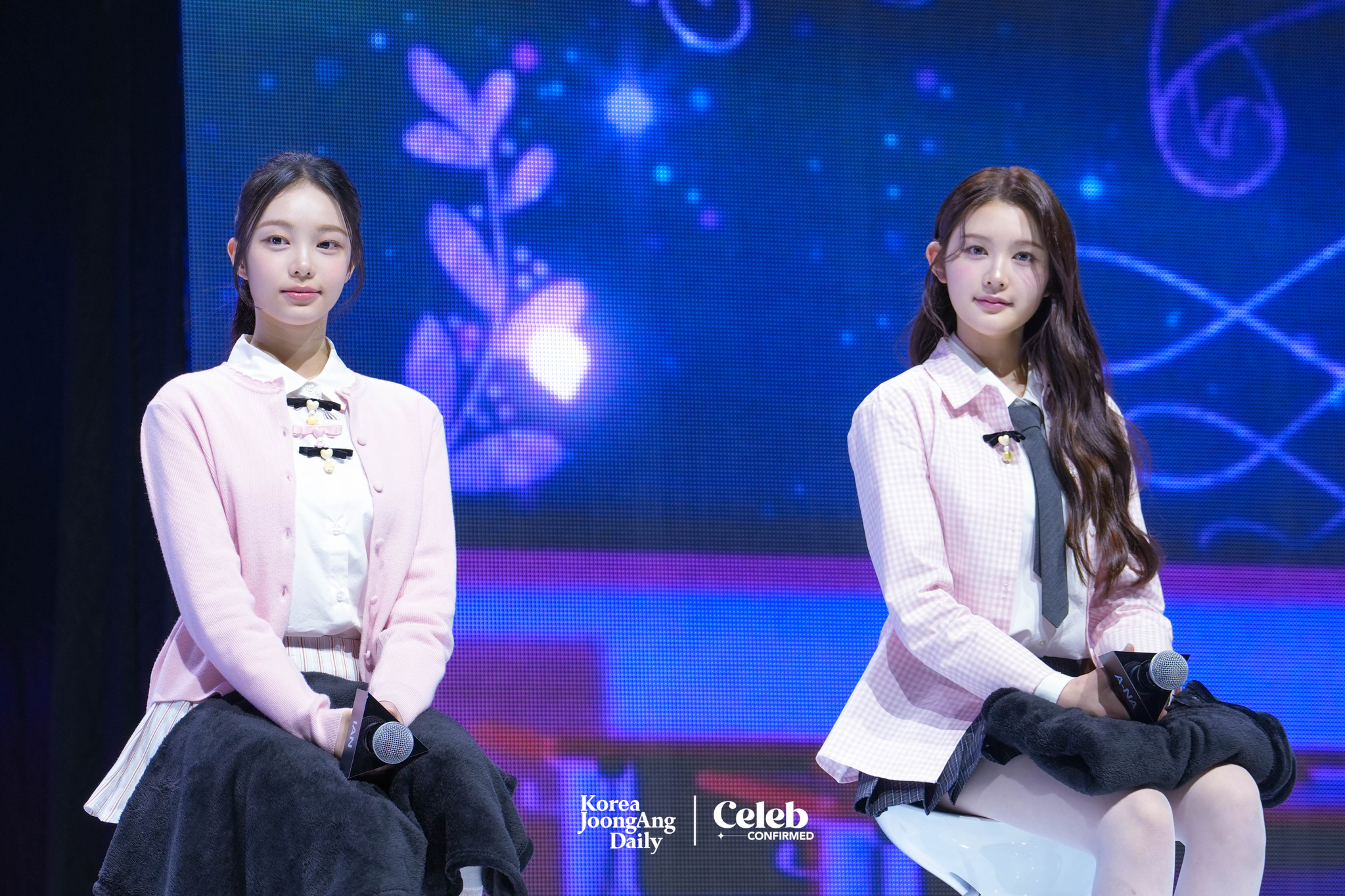 Hearts2Hearts answers reporters’ questions during a showcase held on Feb. 24 at the Yes24 Live Hall in eastern Seoul for the release of its first single “The Chase.” [DANIELA GONZALEZ PEREZ]