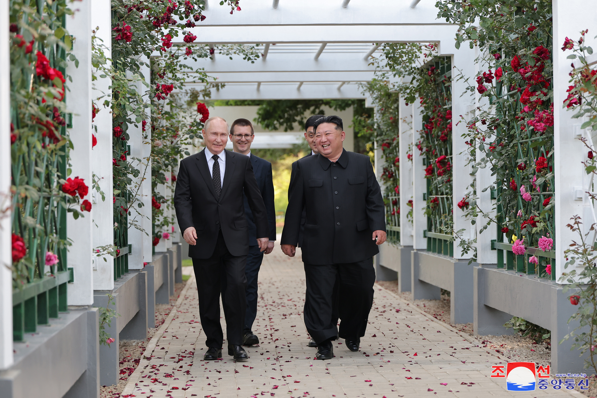 North Korean leader Kim Jong-un, right, and Russian President Vladimir Putin walk side by side in a garden in Pyongyang following the signing of a comprehensive strategic partnership treaty, in this file photo published by the Korean Central News Agency on June 20, 2024. [KOREAN CENTRAL NEWS AGENCY]