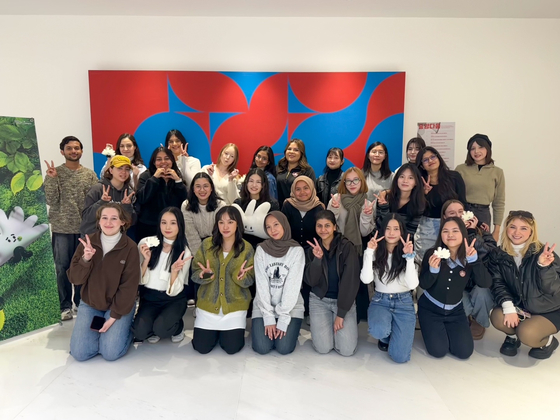 Students in the third batch of K-campus’ University Ambassadors program pose for a photo during the orientation held on Feb. 25, at the JoongAng Ilbo Building in Mapo District, western Seoul. [PARK DAN-BEE]