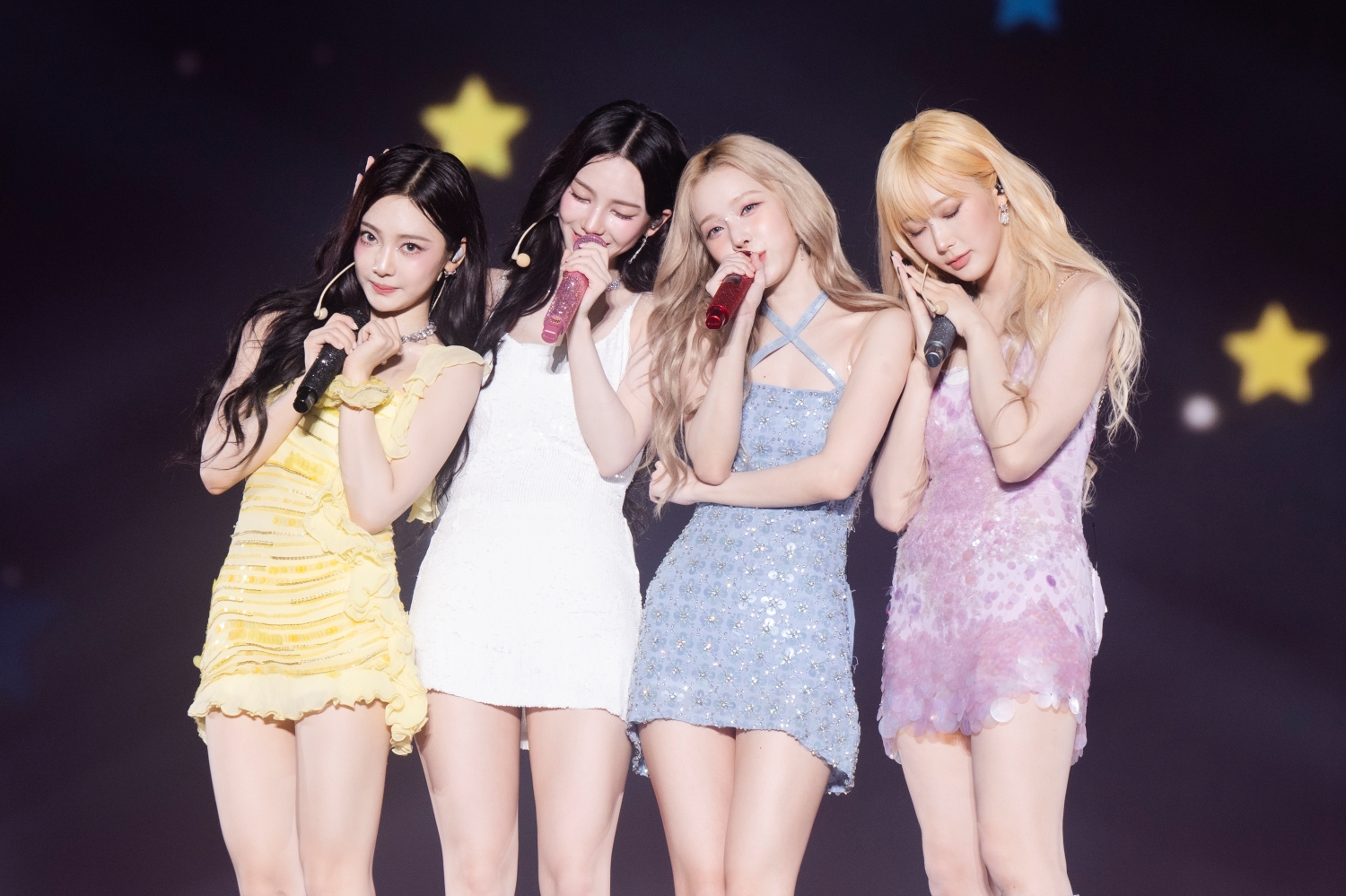 Girl group aespa poses for photos during the special edition of its ongoing “Synk: Parallel Line” world tour, which took place at the Tokyo Dome on Aug. 17 and 18, 2024. [SM ENTERTAINMENT]