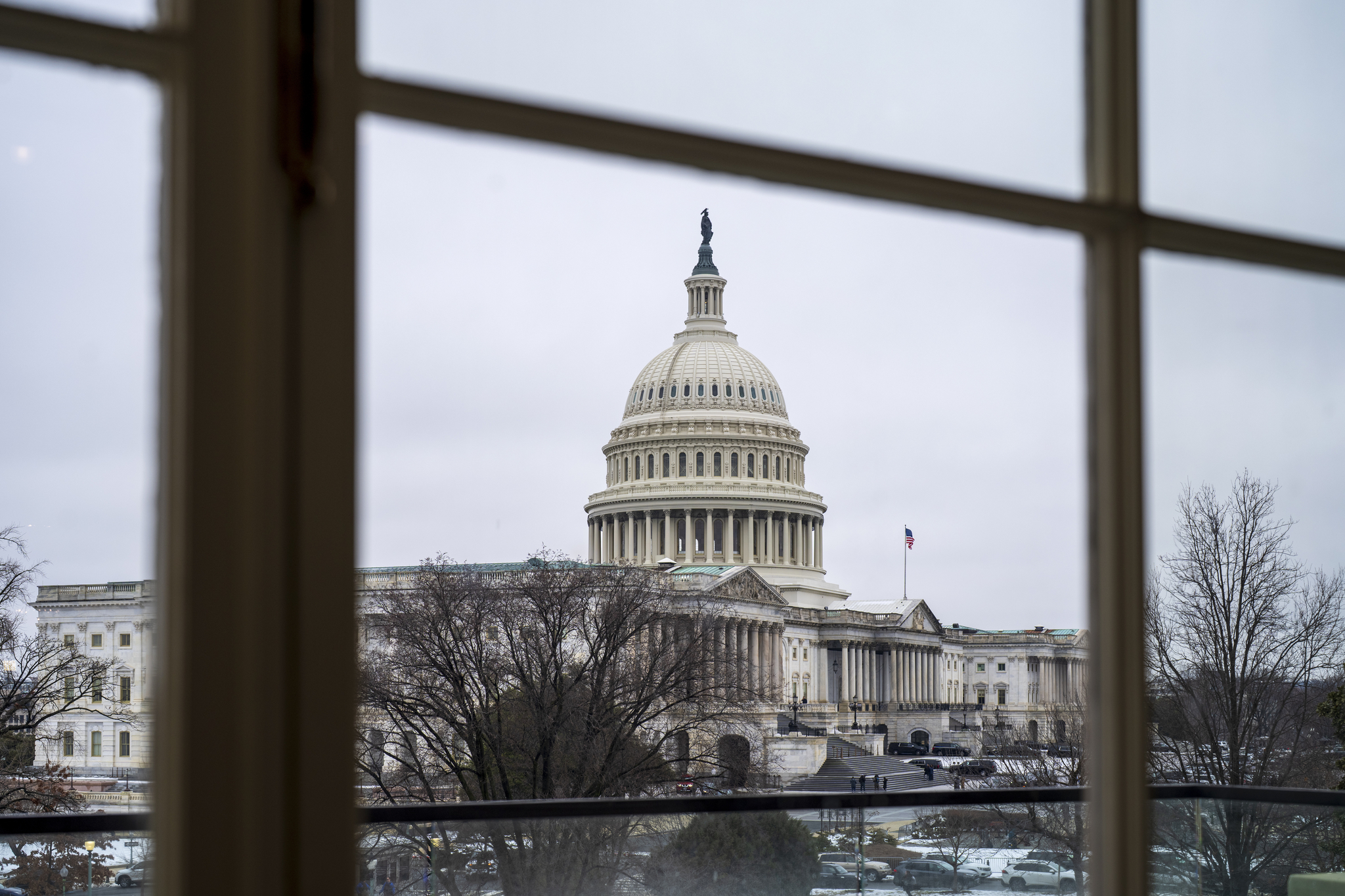 The Capitol is seen framed through a window in the Cannon House Office Building on Capitol Hill in Washington, on Feb. 13. [AP/YONHAP]