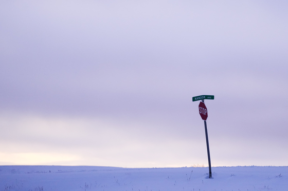 A stop sign is seen on Nanook Ave. in an undeveloped area at the edge of Kaktovik, Alaska, on Oct. 14, 2024, [AP]