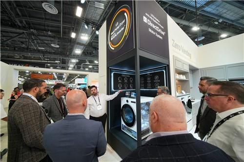 Individuals take a look at LG Electronics' dryer presented during the Design & Construction Week 2025 at the Las Vegas Convention Center in Las Vegas, Nevada, from Feb. 25 to 27. [LG ELECTRONICS]
