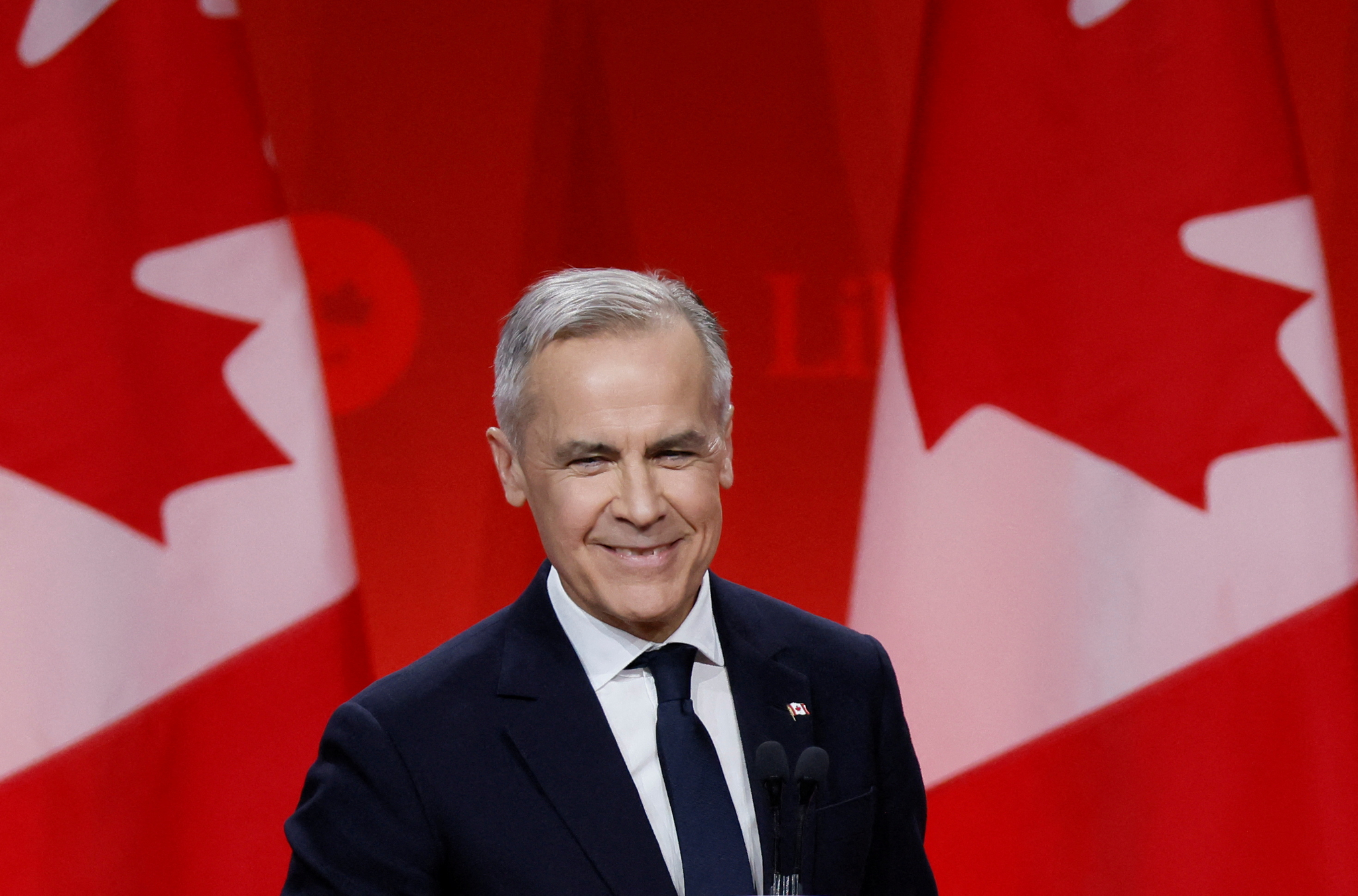 Former Bank of Canada and Bank of England governor Mark Carney smiles as he speaks after winning the race to become leader of Canada's ruling Liberal Party and will succeed Justin Trudeau as Prime Minister, in Ottawa, Ontario, Canada, on March 9. [REUTERS/YONHAP]