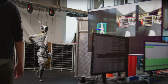 Atlas, an AI-powered humanoid robot from Boston Dynamics, is being trained to perform repetitive tasks in manufacturing plants. [HYUDAI MOTOR]