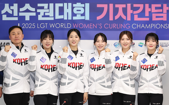 The Gyeonggi Provincial Office Curling Team players take a commemorative photo at the 2025 LGT World Women's Curling Championships Media Day held at the Olympic Hall in Songpa-gu, Seoul, on March 12. [YONHAP]