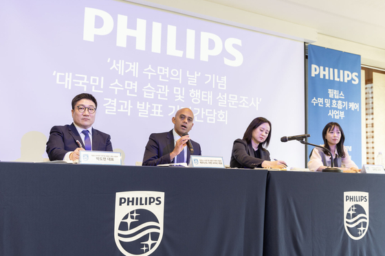 From left, Park Do-hyun, head of Philips Korea's sleep and respiratory care division; Shehaan Fernando, head of Philips’ sleep and respiratory care in the Asia-Pacific region and his translator, and Kim Hye-yun, director of Sleep Medicine Research Center at International St. Mary’s Hospital, takes questions from the press at a briefing at The Westin Josun Seoul in central Seoul on March 12. [PHILIPS KOREA]