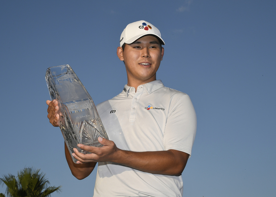 Kim Si-woo poses with The Players trophy at The Players Stadium Course at TPC Sawgrass in Ponte Vedra Beach on May 14, 2017. [PGA] 