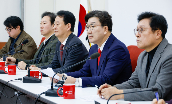 People Power Party floor leader Kweon Seong-dong, second from right, speaks during a press conferece at the National Assembly in Yeouido, western Seoul, on March 16. [NEWS1] 