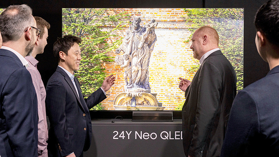 Visitors take a look at Samsung Electronics' Neo QLED 8K TV at 2024 European Tech Seminar in Frankfurt, Germany, in February 2024. [SAMSUNG ELECTRONICS]