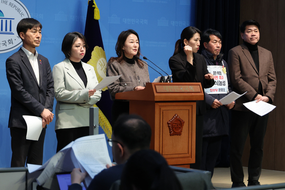Lawmakers of five opposition parties hold a press conference at the National Assembly in Yeouido, western Seoul, on March 17, to explain their plan to file a petition with the Inter-Parliamentary Union to request an investigation into President Yoon Suk Yeol's failed martial law bid. [YONHAP] 