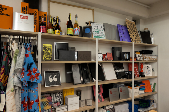 Ordinary People's studio is filled with previous design projects, including K-pop albums and liquor brands. [ORDINARY PEOPLE]