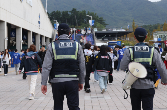 Police patrol for ticket scalpers at Daegu Samsung Lions Park in Daegu in October 2024.  [YONHAP]