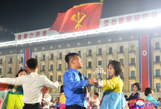 People take part in celebrations to mark Kim Il Sung's birthday at Kim Il Sung Square in Pyongyang on April 14, 2024.  [YONHAP]