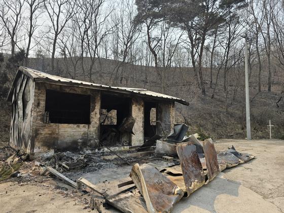 An annex building of a nursing facility for the elderly in Yeongdeok County, North Gyeongsang, is seen after it was burned out by wildfires on March 26. Three of the 21 residents died while evacuating. [LEE EUN-JI] 