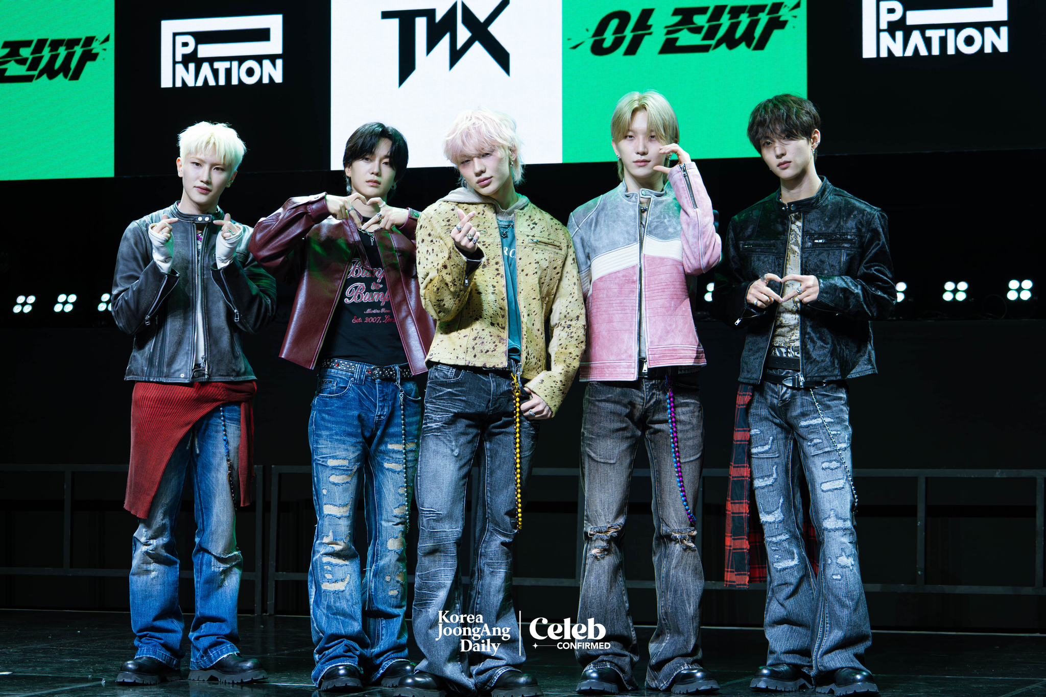 Boy band TNX poses for photos during a showcase held on March 26 at Yes24 Wanderloch Hall in western Seoul for the release of its fourth EP “For Real?” [DANIELA GONZALEZ PEREZ]