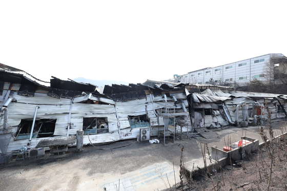 A factory building and materials in the Namhu Agricultural and Industrial Complex in Andong, North Gyeongsang, are seen after being burned by wildfires on March 31. [YONHAP]  