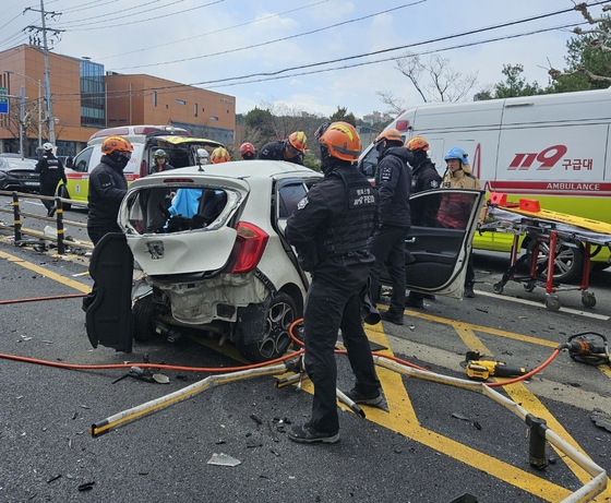 The wreckage of a compact car is seen in Cheongju, North Chungcheong after the driver of a Hyundai Sonata crashed into it killing three people and injuring six others on March 30. [NEWS1]