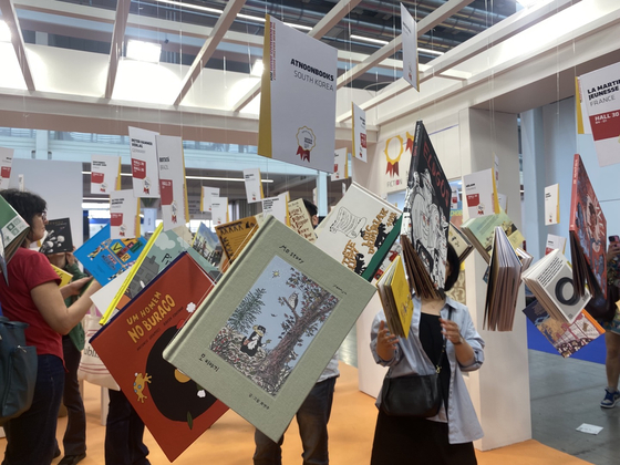 Visitors look at Korean children's books at the 61st Bologna Children’s Book Fair in Italy on April 9, 2024. [JOONGANG ILBO]