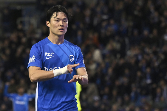 KRC Genk forward Oh Hyeon-gyu celebrates scoring during the Belgian Pro League match against KAA Gent at Cegeka Arena in Belgium on March 30. [AFP/YONHAP] 