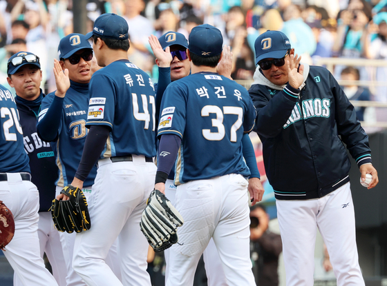 The NC Dinos celebrate after a KBO game against the Kia Tigers at Gwangju-Kia Champions Field in Gwangju on March 23. [YONHAP] 