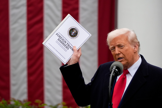 U.S. President Donald Trump speaks about lists of countries' barriers to U.S. exports during a tariff announcement in the Rose Garden of the White House in Washington on April 2. [EPA/YONHAP]