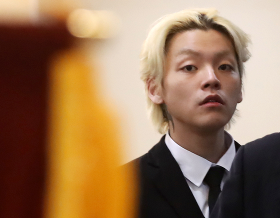 Rapper Noel at the funeral of his father, late politician Chang Je-won, on April 2 in Busan [NEWS1]