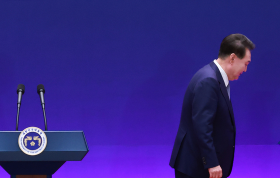 Former President Yoon Suk Yeol walks off the podium at a press conference held at the Blue House in Jongno District, central Seoul, on May 27, 2024. [YONHAP] 