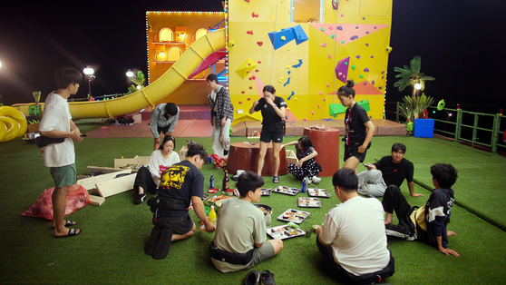 Scenes from Netflix's entertainment show ″Kian’s Bizarre B&B,″ featuring webtoonist Kian84, singer Jin of boy band BTS and actor Ji Ye-eun [NETFLIX]