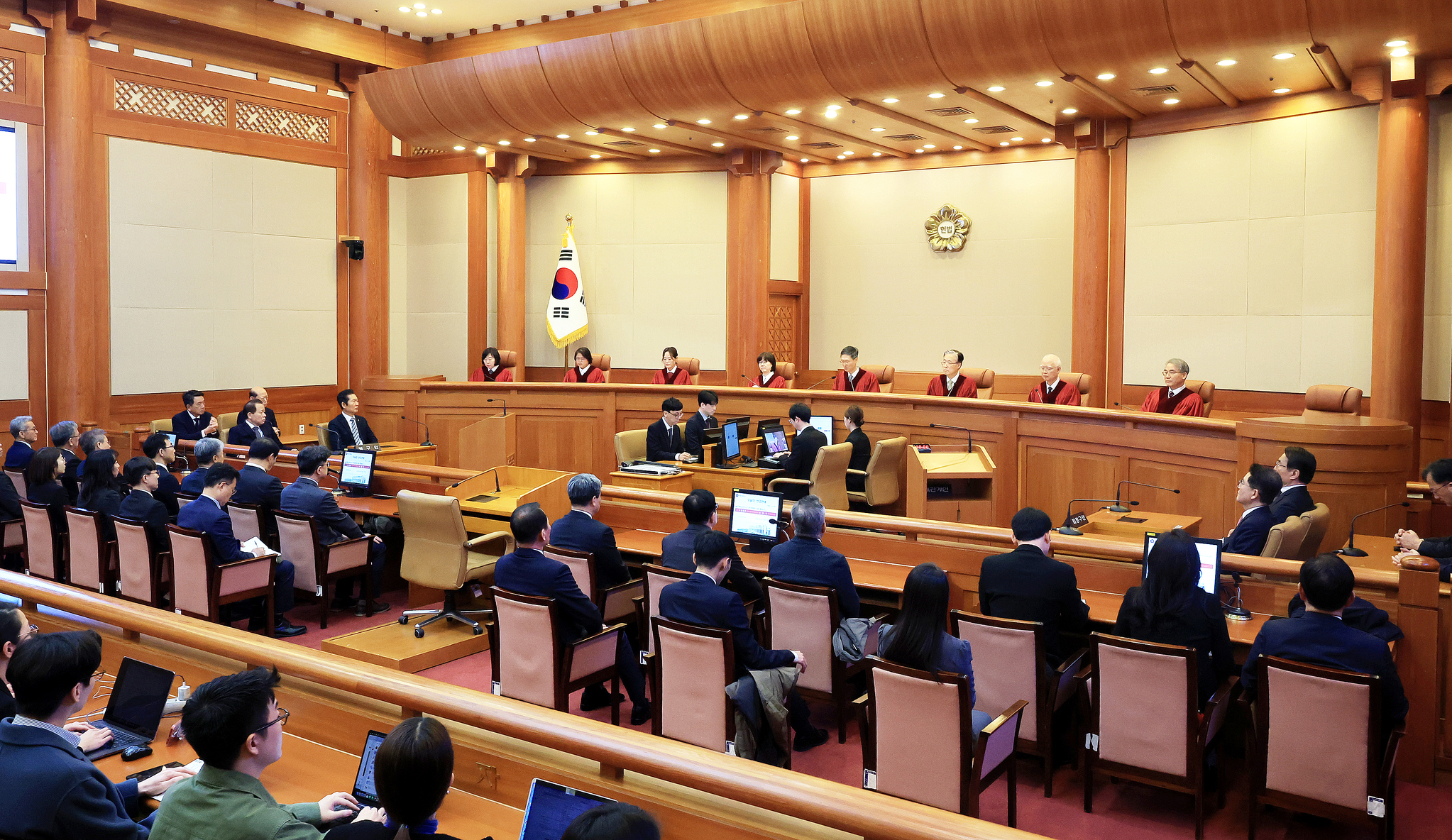 Constitutional Court justices announce their ruling on President Yoon Suk Yeol's impeachment at the court in Jongno District, central Seoul, on April 4. [JOINT PRESS CORPS] 