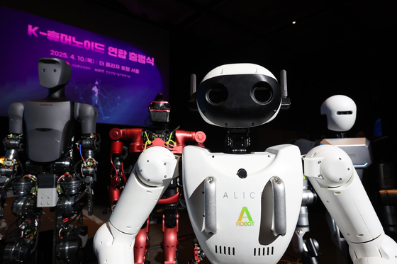 Humanoid robots are on display at the launch ceremony of the K-Humanoid Alliance, an association of academia, research institutions and private firms for coordinated robotics development, at the Plaza Hotel in Jung District, central Seoul, on April 10. [YONHAP]