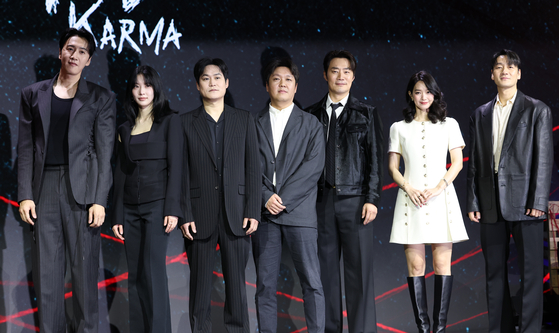 The cast of Netflix show ″Karma″ pose for a photo during the series' press conference held in Jongno District, central Seoul, on March 31. Actor Park Hae-soo is pictured on the far right. [NEWS1]
