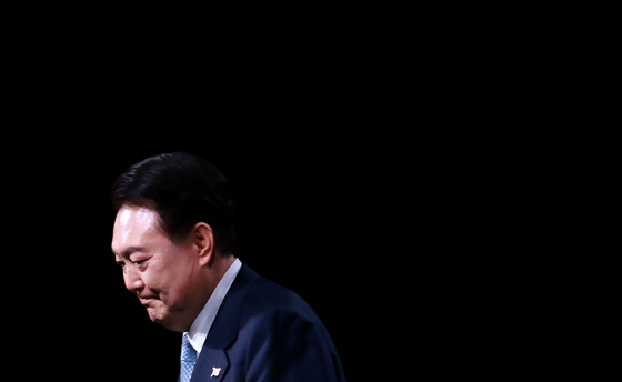President Yoon Suk Yeol attends the opening session of the Ministerial Conference of the Third Summit for Democracy in March last year. The Constitutional Court upheld the National Assembly’s impeachment of Yoon, ousting him from office on April 4. [YONHAP]