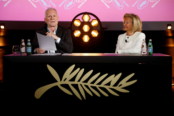 Cannes Film Festival General Delegate Thierry Fremaux, left, speaks next to Cannes Film Festival President Iris Knobloch during a press conference to present the official selection of the 78th Cannes International Film Festival in Paris, France, on April 10. [REUTERS/YONHAP]