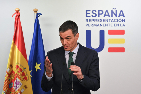 Spain's Prime Minister Pedro Sanchez addresses the media during a press conference at the end of a Special European Council to discuss continued support for Ukraine and European defence at the EU headquarters in Brussels on March 6. [AFP/YONHAP]