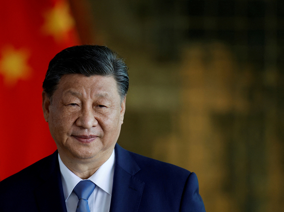 FILE PHOTO: FILE PHOTO: China's President Xi Jinping attends a meeting with Brazil's President Luiz Inacio Lula da Silva, in Brasilia, Brazil November 20, 2024. REUTERS/Adriano Machado/File Photo/File Photo