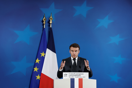 French President Emmanuel Macron speaks during a press conference after a European Union leaders' special summit to discuss Ukraine and European defence, in Brussels on March 6. [REUTERS/YONHAP]