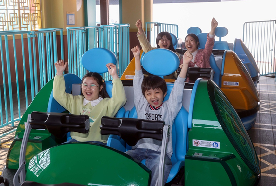Children ride Legoland Korea's new Masters of Spinjitzu attraction. [LEGOLAND KOREA]