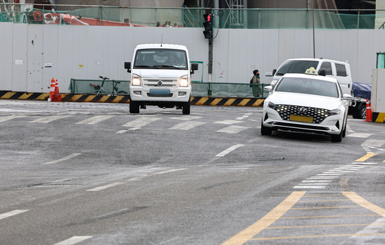 The road near the construction site of Shinansan Line underground tunnel construction site in Gwangmyeong, Gyeonggi is seen elevated on April 14. [NEWS1]