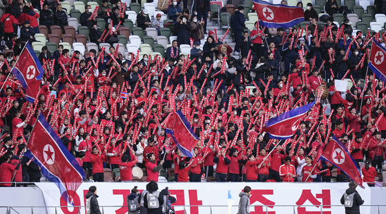 North Korean fans support their country during a Paris Olympic qualifer against Japan at the Japan National Stadium in Tokyo, Japan on Feb. 28. [YONHAP] 