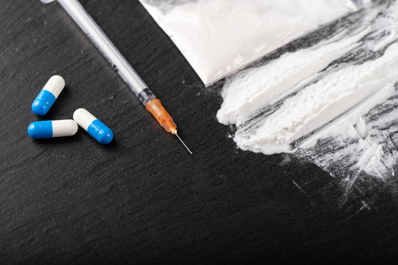 Example of drugs and a syringe [GETTY IMAGES BANK]