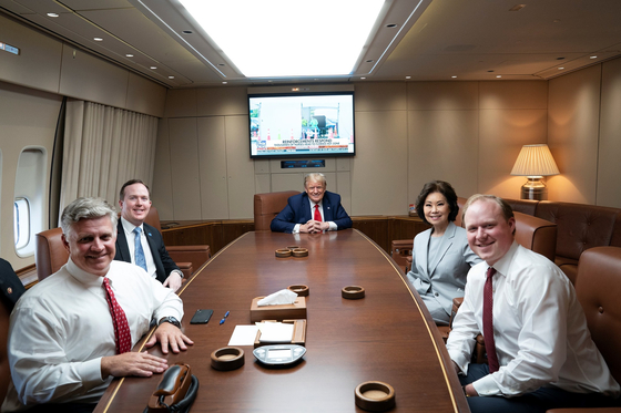 Former Georgia congressman Drew Ferguson, far left, posted a photo of his meeting with U.S. President Donald Trump on an Air Force One flight to his Facebook page on July 17, 2020. [SCREEN CAPTURE]