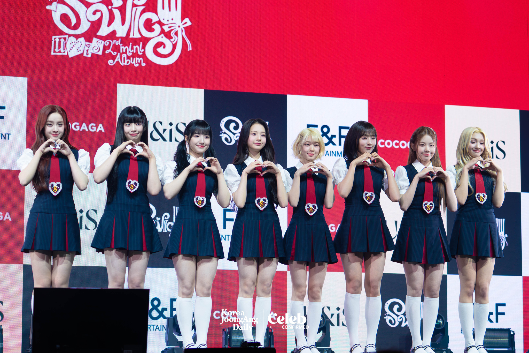 Girl group UNIS poses for photos during a showcase on April 15 at Yes24 Live Hall in eastern Seoul for the release of its second EP, ″Swicy.” [DANIELA GONZALEZ PEREZ]